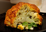 Whole Roasted Cauliflower with an Aromatic Anisata Spiced Sour Cream and Cheese Crust