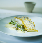 Crispy Skinned Barramundi on a Bacon and Herb Griddle Cake with Lemon Aspen Butter Sauce